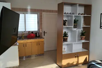 Image de Apparemment studio neuf dans un quartier calme résidentiel 10min de la plage