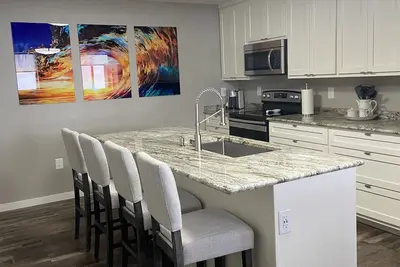 Image de Contemporary 1400 sq ft space in lower level Open concept gas burning fireplace