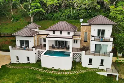 Image de Enchanting blend of sea views and lush green hillside panoramas.