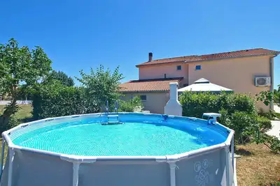 Image de Appartement de vacances avec piscine partagée