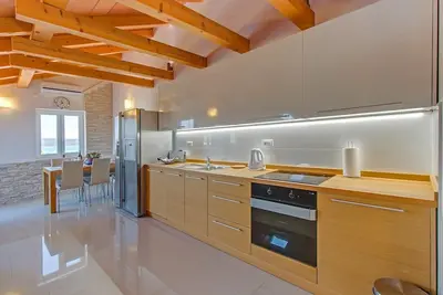 Image de Apartment Rose with large heated pool 50m2 and sea view