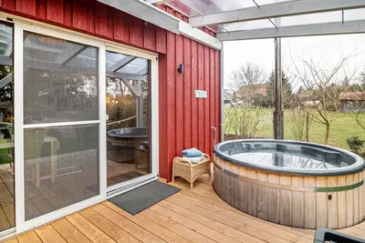 Image de Maison de vacances 'Vroni' avec terrasse privée, jardin privé, bain à remous et Wi-Fi