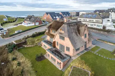 Image de Ein Traum von Ferienhaus Wartet mit dem Noller`s Hüs in Wenningstedt auf Sie