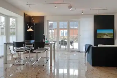 Image de End-appartement im Erd- und Untergeschoss mit ca. 98 qm Nutzfläche