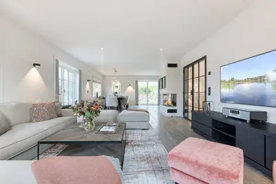 Image de In Diesem Tollen Ferienhaus Spuren im Sand Haben Sie Platz für bis zu 8 Personen