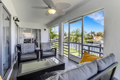Image de Serene & sunlit waterfront home with dock, patio, & incredible views - near golf