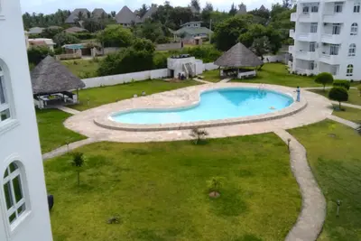 Image de Cossy apartments, 3 minutes walk to the beach, free WiFi, pool, parking.