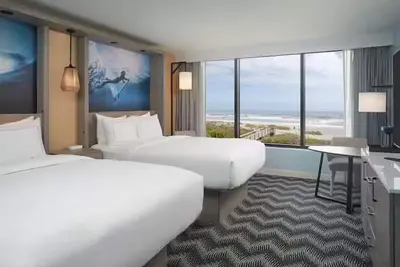 Image de Seaside Symphony! Short Drive to TreeTop Trek and Brevard Zoo! Onsite Pool!