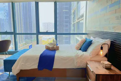 Image de Bgc Cozy Condo - Pool & Wi-Fi - Suite 17