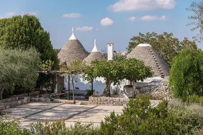 Image de Trulli Mestandrea al poggio. lovingly restored trulli.