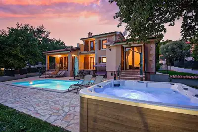 Image de Superbe maison à Fuskulin avec jacuzzi