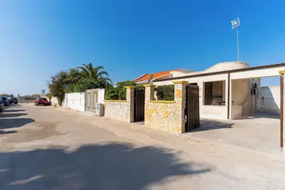 Image de Villa 'Letizia Baia Del Sol' avec terrasse privée et climatisation