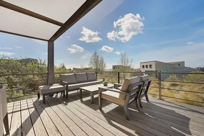 Image de The 6-person Villa Comfort features a comfortable and stylishly decorated interior, views of the landscape, perfect for dogs and children.