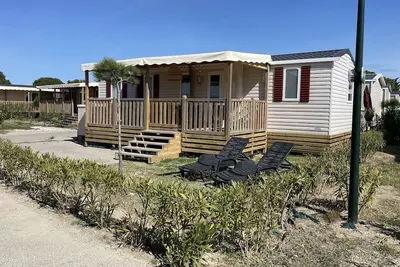 Image de Mobil-home tout confort, bord de mer. Vue coucher de soleil sur l'étang.