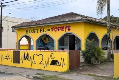 Image de Quartos Comunitários e Áreas Comuns Aconchegantes, Hostel - a 5 min da Praia!