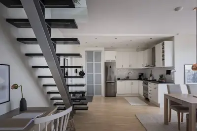Image de A top floor duplex with city views and chimney
