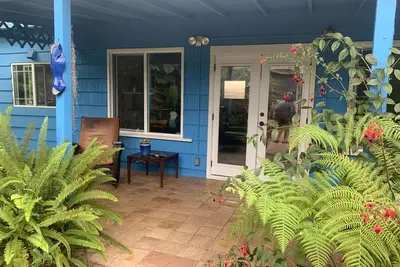 Image de Charming beach cottage in a beautiful garden setting.