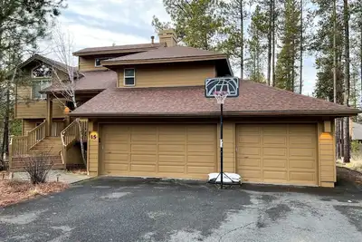 Inviting house with hot tub, game tables, bikes, & partial mountain view