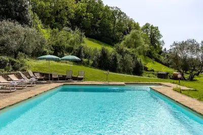 Image de Agritourisme \"Podere San Bartolo - Fienile\" avec piscine partagée, terrasse privée et Wi-Fi
