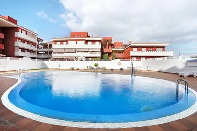 Image de Appartement de vacances 'M Y C El Puertito' avec vue sur la montagne, piscine partagée et Wi-Fi
