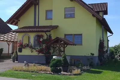 Image de Appartement 'Ferienwohnung 'am Bienwald'' avec balcon et Wi-Fi