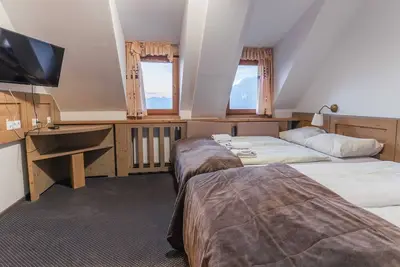 Krvavec Quadruple room 1