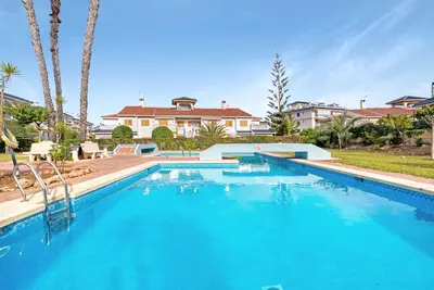 Image de Appartement \"Parque Mar V\" avec piscine partagée, Wi-Fi et climatisation