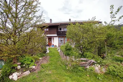 Image de Appartement 'Ferienwohnung Beim Roana' avec vue sur montagne, terrasse privée et jardin privé