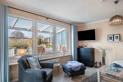 Image de Maison de vacances 'Ferienhaus Am See Mit Boot' avec terrasse privée, Wi-Fi et climatisation