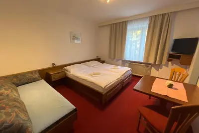 Image de Zimmer 18 \/ 3bett Ohne Balkon - Pension Alpina
