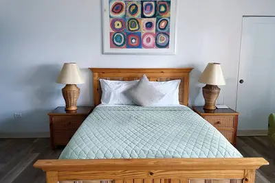 Cozy Beachfront Oasis less than 10 steps away from the Caribbean Sea