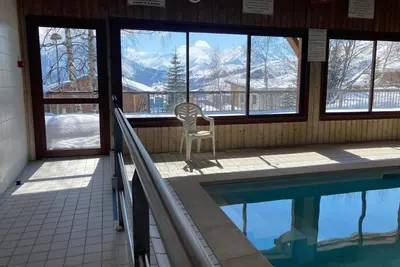 Image de Appartement 2 chambres dans un chalet Ă La Toussuire avec piscine et sauna