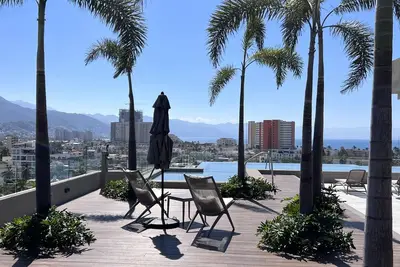 Image de Brand New corner unit in Versalles, 2 bed, 2 baths. Roof top pool W great views