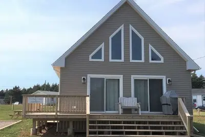 Beach House across from Savage Harbour Beach with Spectacular Ocean View!