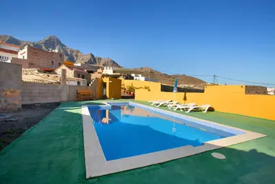 Image de Maison de vacances 'Villa Paraiso Aldeano 2' avec vue sur la montagne, piscine partagée et Wi-Fi