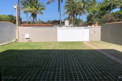 Image de Casa Para 10 Pessoas, com Terraço, Jacuzzi e Churrasqueira. 2min da Praia