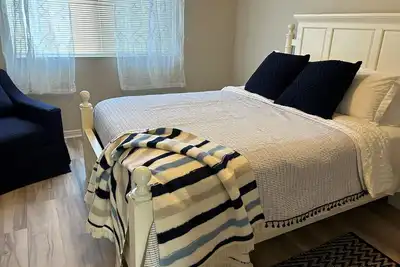 Image de Welcome to this haven that seamlessly blends modern comfort with classic charm.