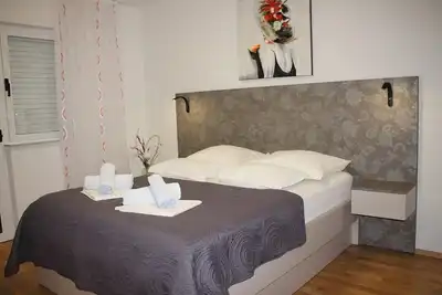 Image de Appartement de deux chambres avec le balcon et la vue sur le mer Makarska (A-21911-c)