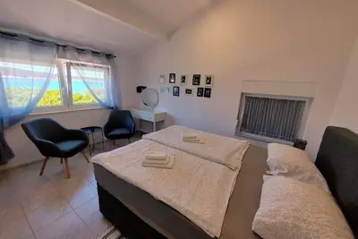 Image de Appartement de deux chambres prés de la plage Barbat, Rab (A-21957-a)