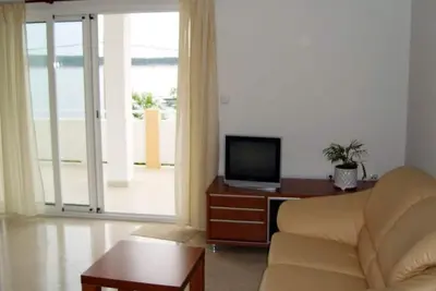 Image de Appartement de deux chambres avec la terrasse et la vue sur le mer Barbat, Rab (A-22053-a)