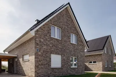 Image de Maison de vacances Butjadingen pour 1 - 6 personnes avec 3 chambres à coucher - Maison de vacances