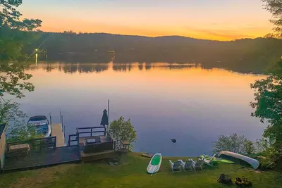 Image de Lakefront home near ski resorts with water view, dock, deck, fireplaces, & W\/D
