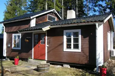 Image de Strandnära Stuga vid Sjön Möckeln