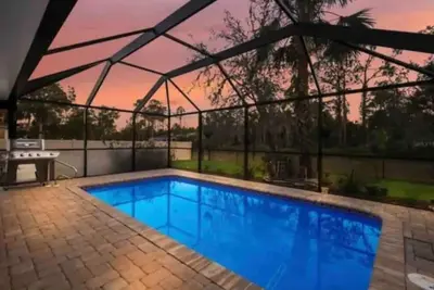 Image de Heated Saltwater Pool Short Drive 2 Gulf Beaches! Cute and Cozy 3 bed 2 bath