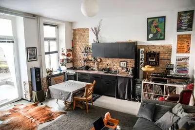 Image de Loft/Appartement cosy et calme avec jardin privé dans un quartier animé