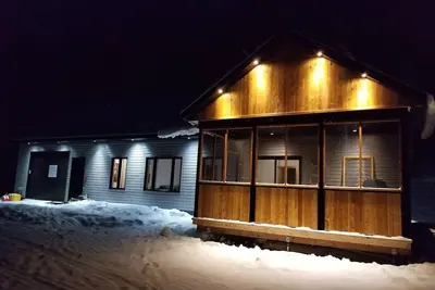 Image de Les chalets Amarok, vous présente le chalet au pied chaud, paradis du plein air!