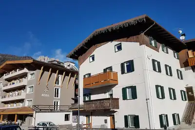 Image de Family apartment, in the center of Pozza di Fassa, 2 steps from the lifts.