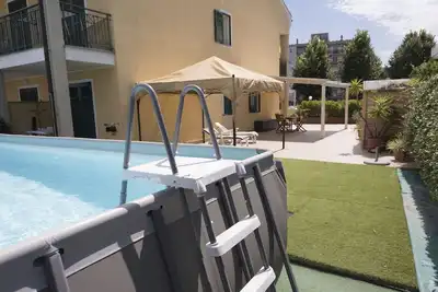 Image de Tiziana House with large patio, private pool and reserved parking.