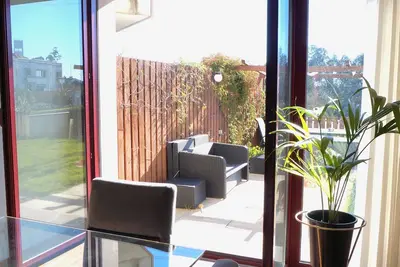 Image de Sunny Spacious Condo w\/ Private Garden+pool Fully Equipped and Surnished