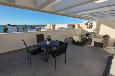 Image de Penthouse El Carmelo: New, modernly furnished with huge terrace, <50m from beach